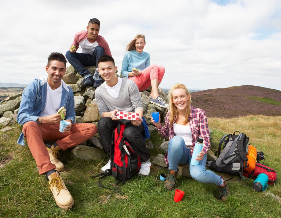 Group,Of,Young,People,Hiking,In,Countryside